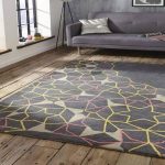 What makes handmade rugs an essential element in interior design?